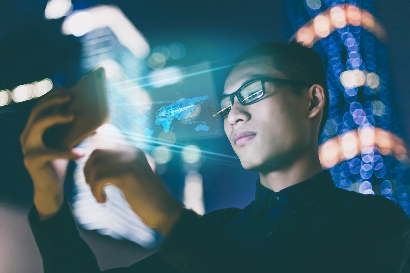 Man wearing glasses using smartphone to access data in a city setting.
