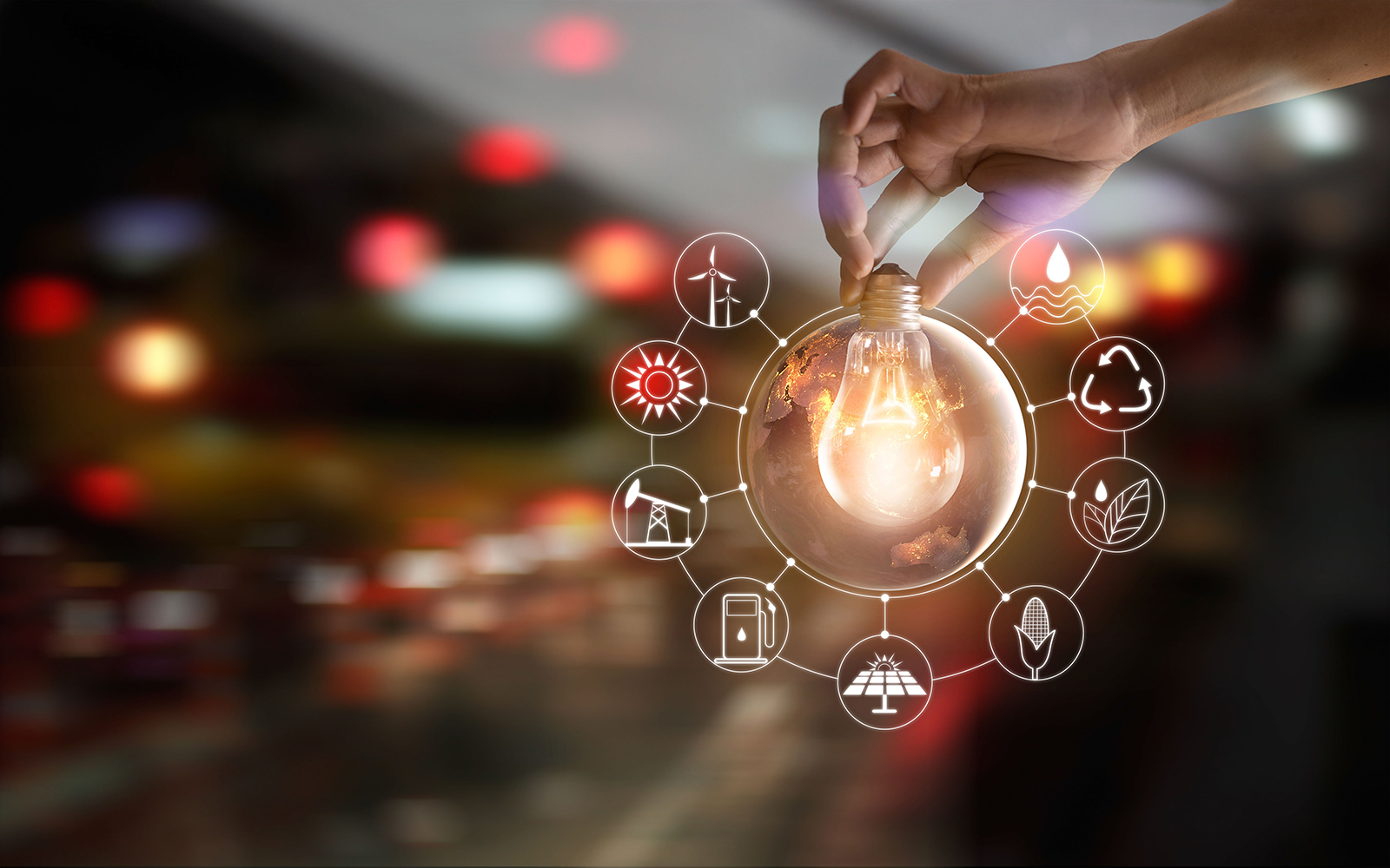 Energy icons linked to a glowing light bulb