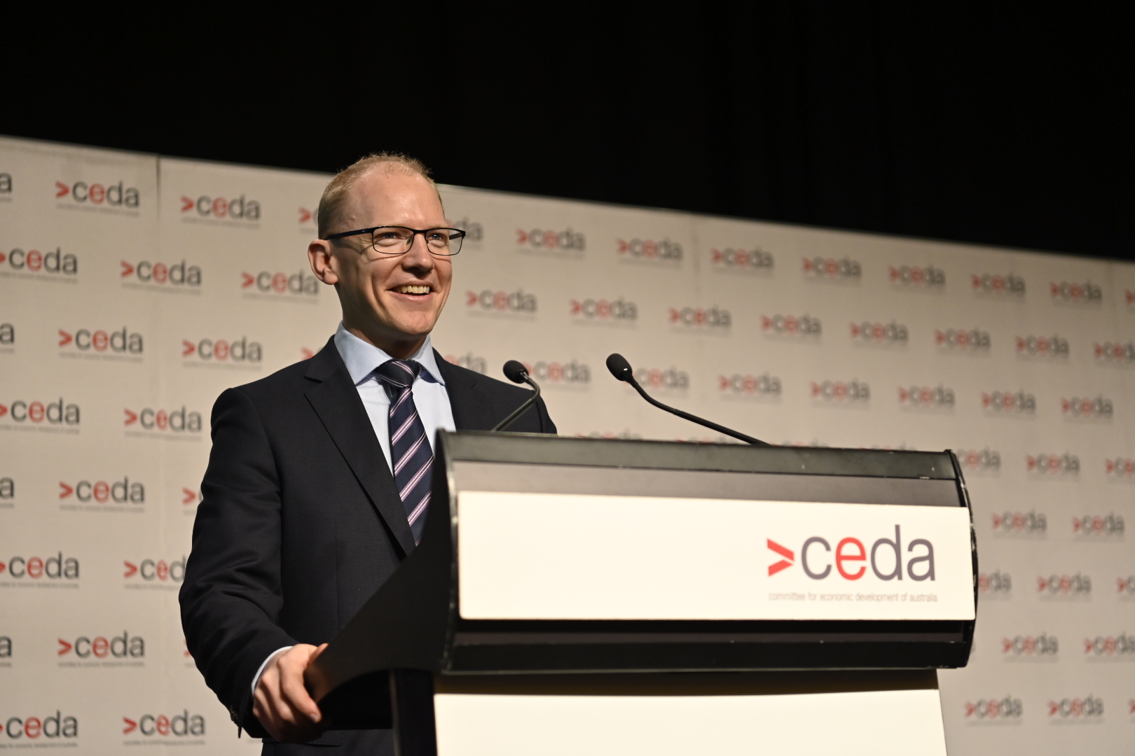 CEO at CEDA podium