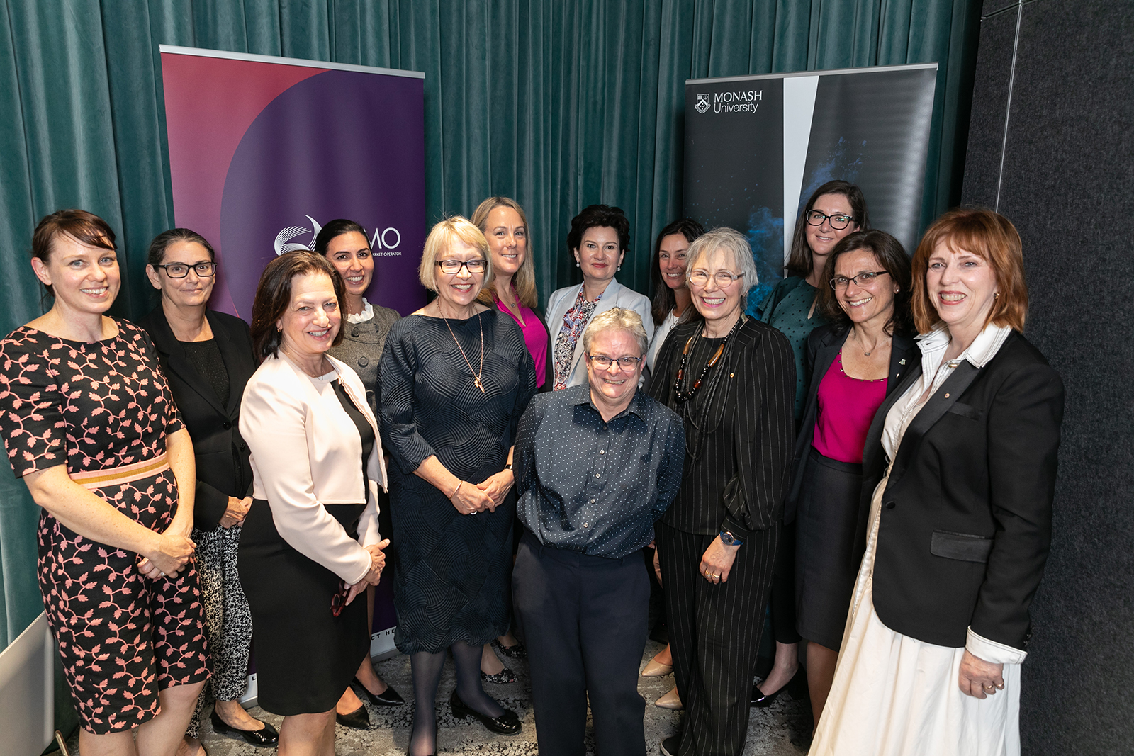 Female energy industry executives at event