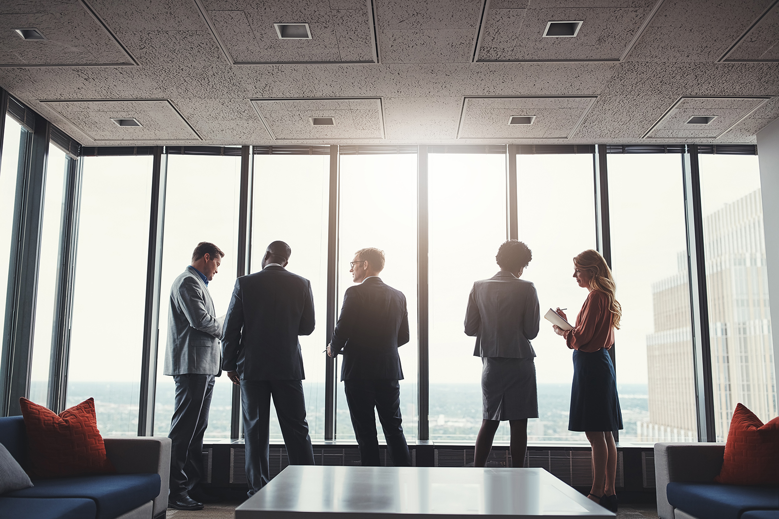 Group of business people assembled in a boardroom