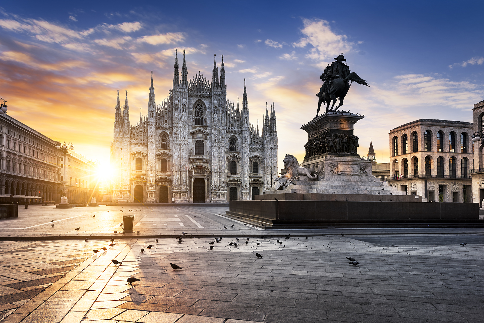 Sun pouring through square in Milan, Italy
