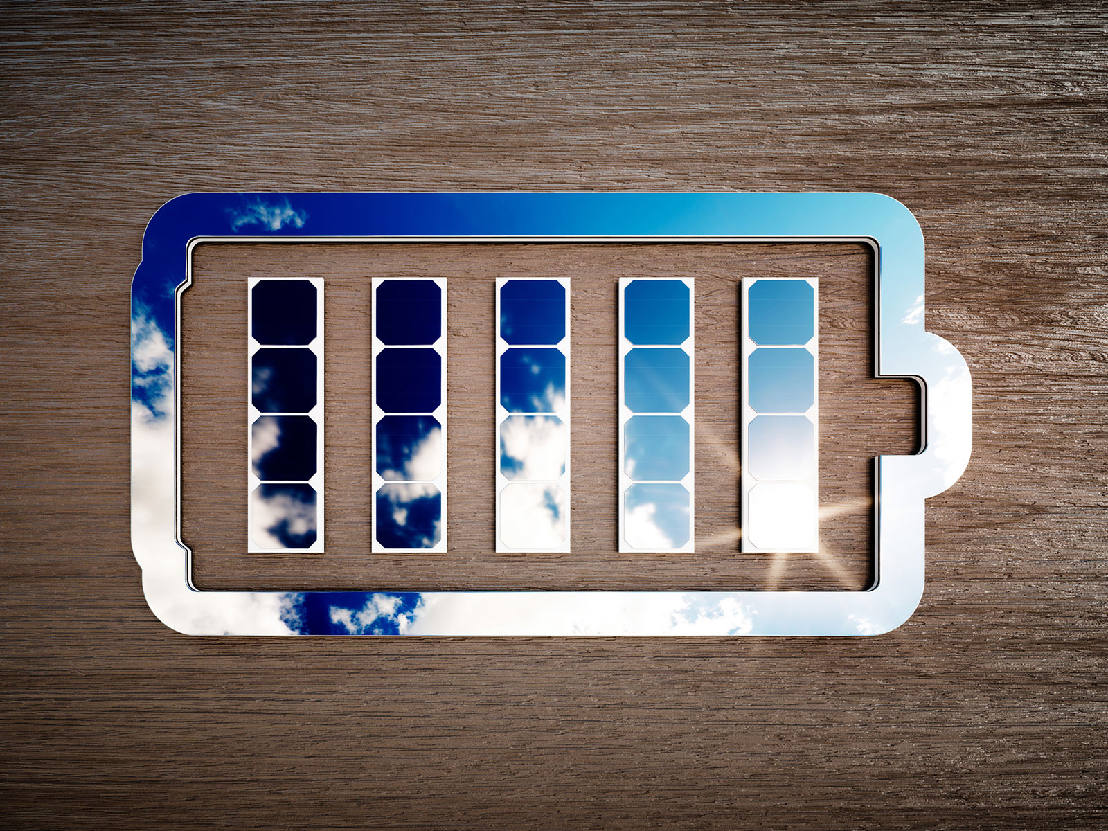 Battery symbol created from solar panels reflecting sky